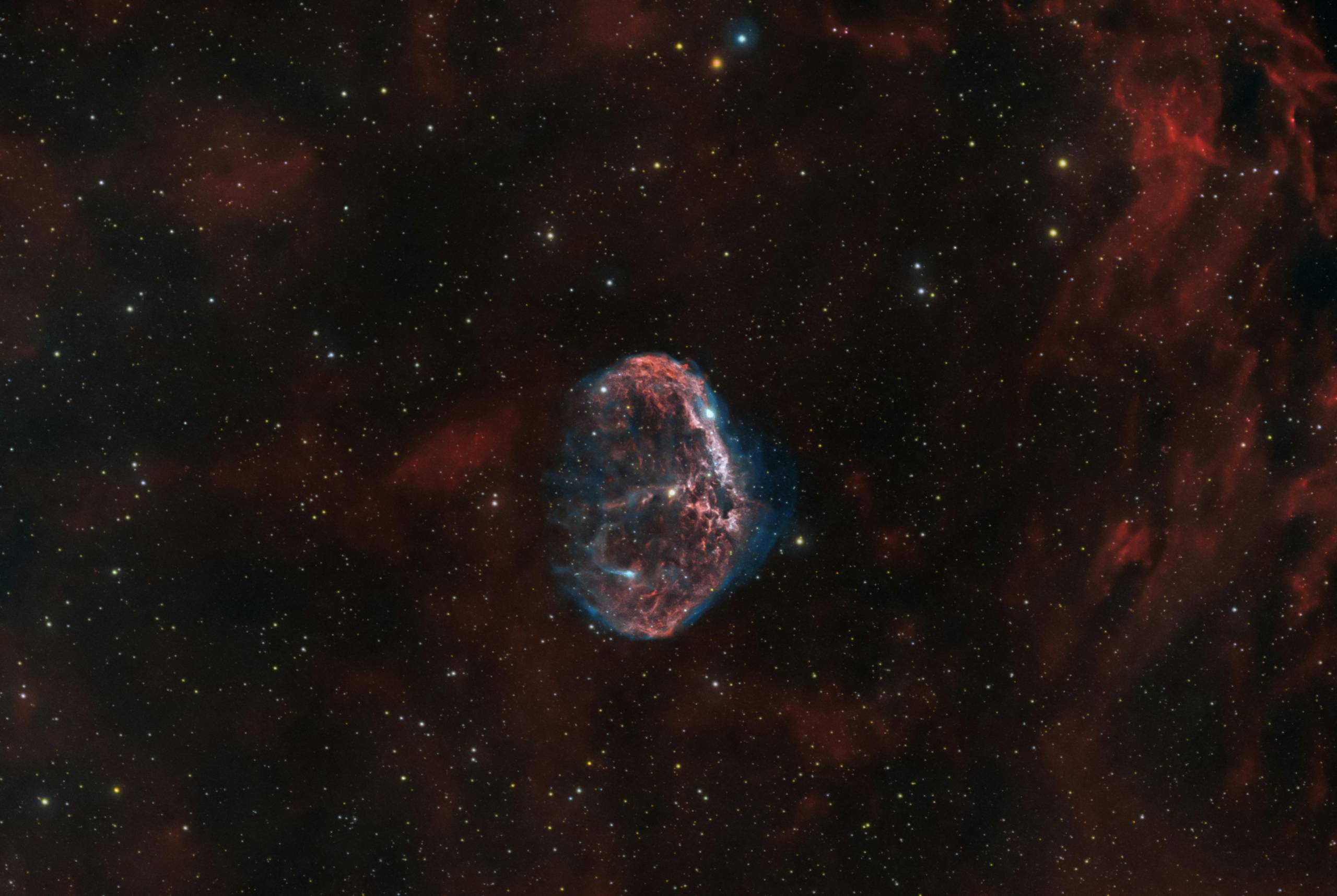 A breathtaking high-resolution image of a nebula in deep space, showcasing vibrant colors.
